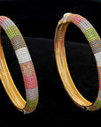 Diamond Bangles with Blue sapphires, Pink Sapphires, Amethyst,Tsavorite and Tanzanite.