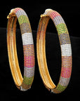 Diamond Bangles with Blue sapphires, Pink Sapphires, Amethyst,Tsavorite and Tanzanite.