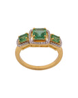 Diamond and Emerald Three-Stone Halo Ring