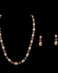 Diamond Necklace Set with Carved Coral and Spinel Floral Detailing