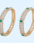 Diamond Bangles with Emeralds in a Classic Design