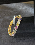 Diamond Bracelt with Multi color Sapphires.