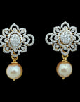 Diamond Jhumkhas with Natural Changable Rubies and Pearl Drops .