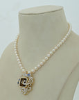 Pearl Necklace with Diamond Pendant and Interchangeable Emerald, Ruby, Sapphire and Tanzanite