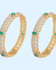 Diamond Bangles with Emeralds in a Classic Design