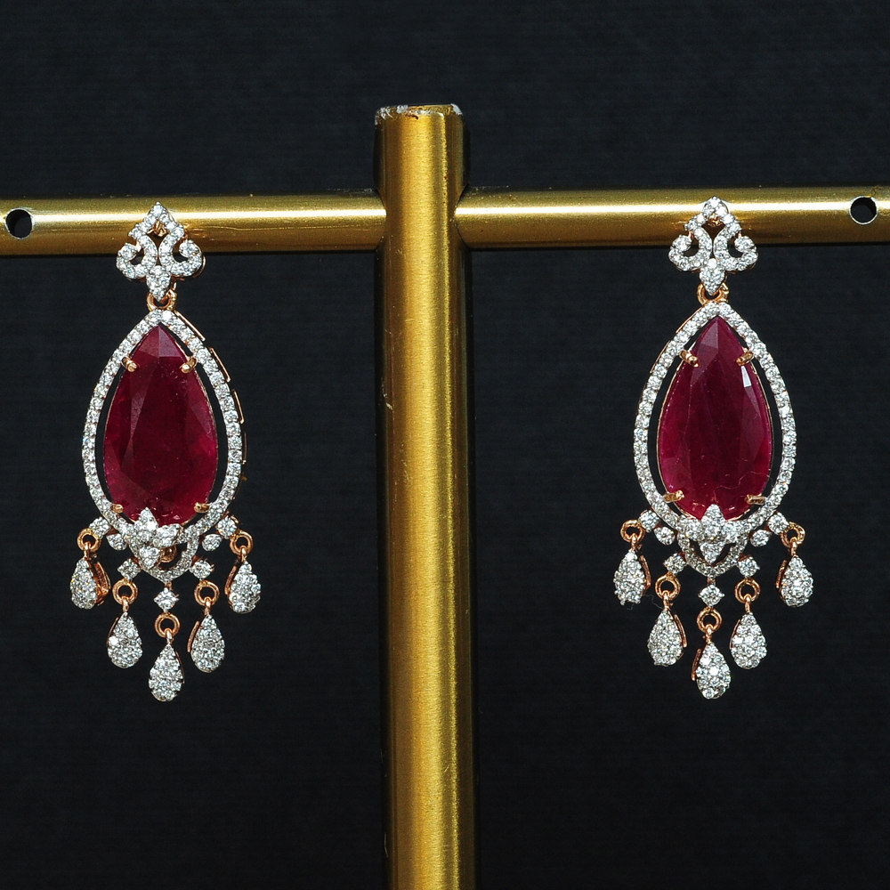 Exquisite Raindrop Shaped Diamond Earrings with Natural Rubies.