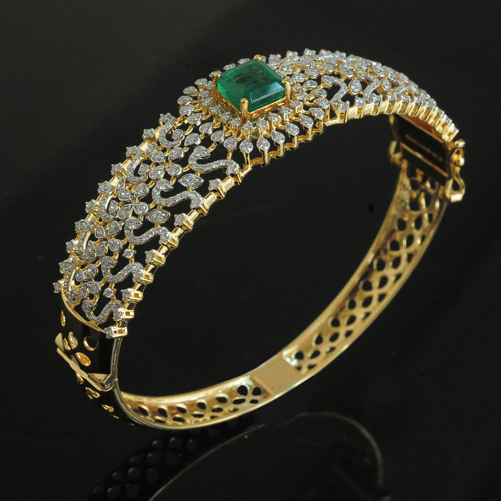 Diamond Bracelet with changeable Natural Emeralds/Rubies.