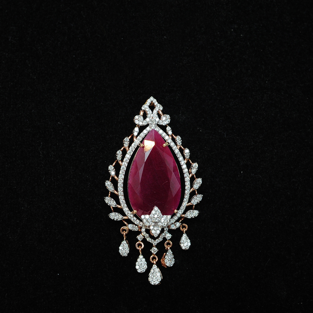 Exquisite Raindrop Shaped Diamond Pendant with Natural Rubies.