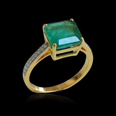 diamond ring with natural emeralds.