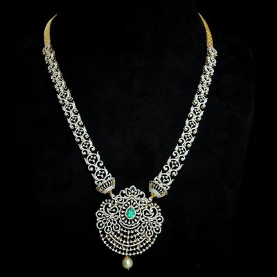 4 in 1 diamond necklace with changeable natural emeralds/rubies and pearl drops.