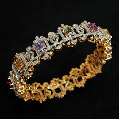 diamond bangle with multi-colored sapphires