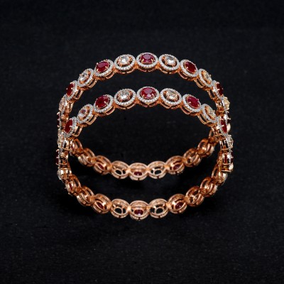 diamond bangles with natural rubies and white sapphires.