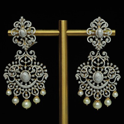 diamond earrings with changeable natural emeralds/rubies and pearl drops.