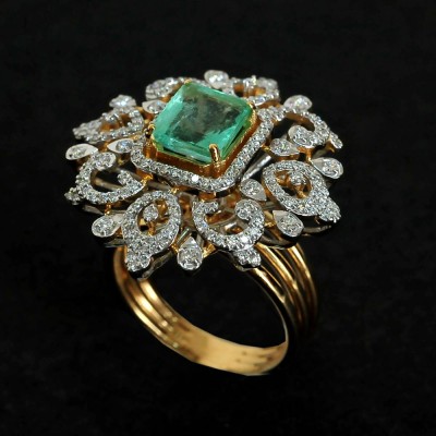 diamond ring with natural emerald.